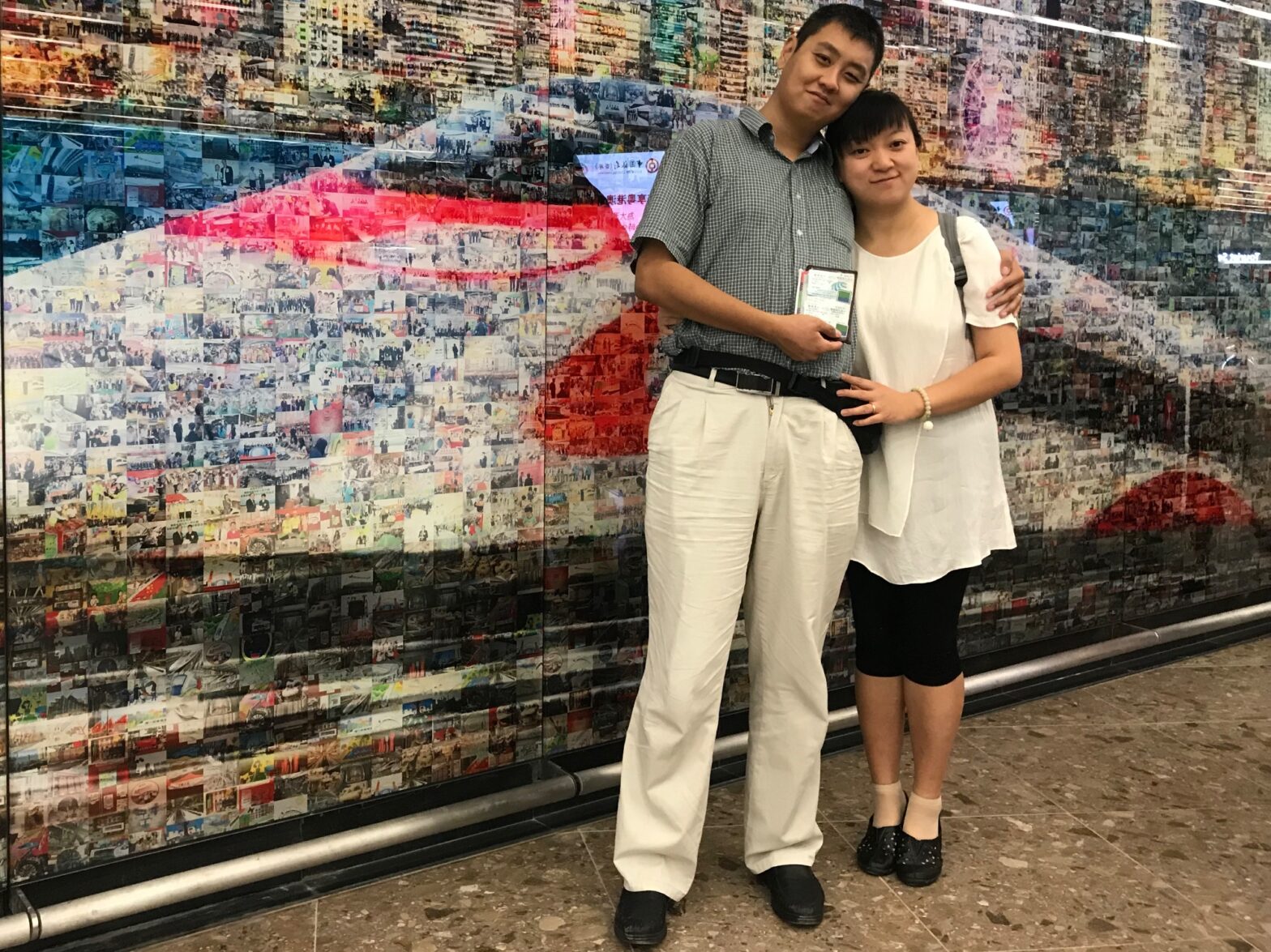 An image of David Feng and wife Tracy at Hong Kong West Kowloon railway station