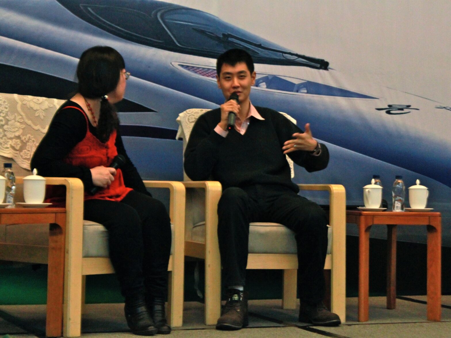 David Feng onstage at a China HSR summit in Beijing